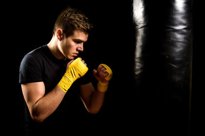 Man training with punching bag