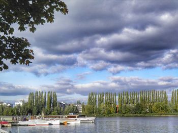 Scenic view of lake against cloudy sky