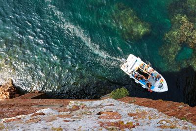 High angle view of ship sailing in sea