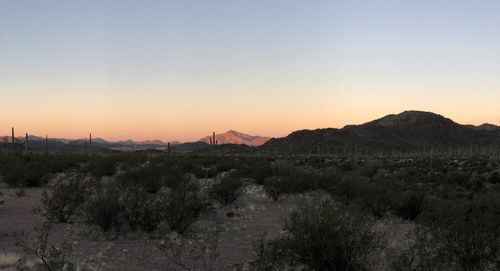 Scenic view of landscape against sky during sunset