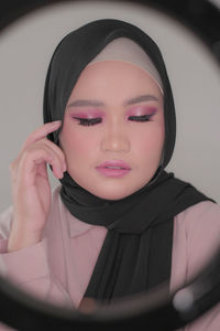 Close-up portrait of a young woman