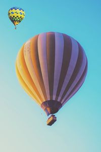 Low angle view of hot air balloon against clear sky