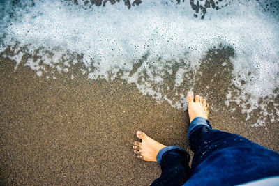 Low section of person on beach