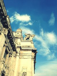 Low angle view of church against blue sky