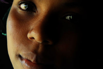 Close-up portrait of young woman
