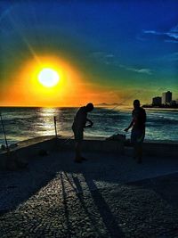 Scenic view of sea at sunset