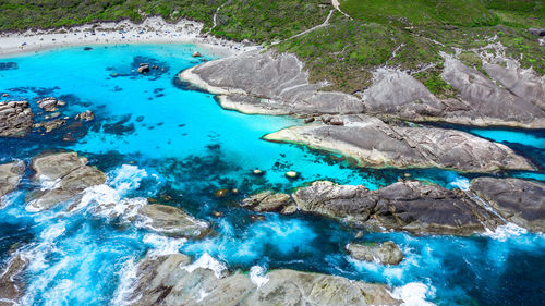 Aerial image of elephant rocks and green pools in denmark, western australia.