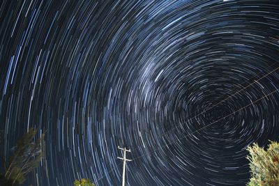 Close-up of fireworks against sky at night