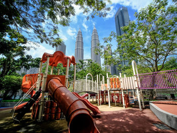 Low section of woman sitting on field