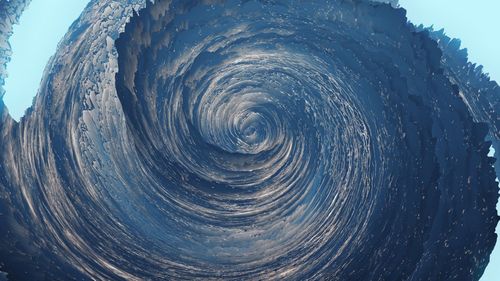 Low angle view of rippled water against sky