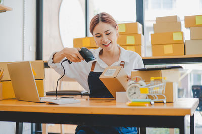 Young businesswoman working in office