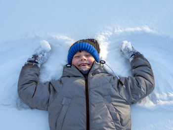 Portrait of man in snow