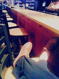 View of two people relaxing in the dark