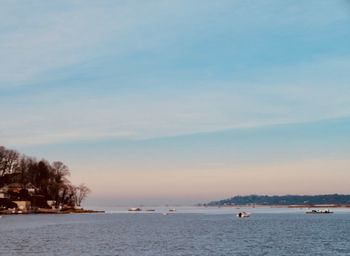 Scenic view of sea against sky during winter