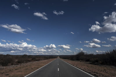 Empty road against sky