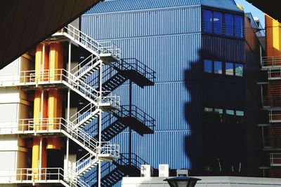 Low angle view of fire escape against sky