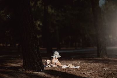 Rear view of woman standing in park