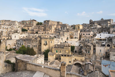 Buildings in city against sky