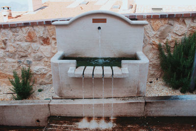 Fountain in front of building