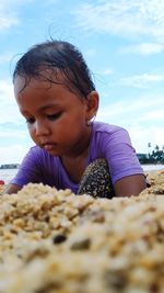 Close-up portrait of boy looking away
