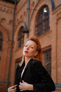 Portrait of a young woman looking away