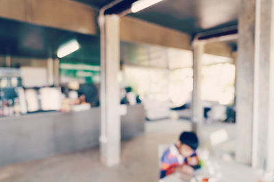 Defocused image of people in corridor