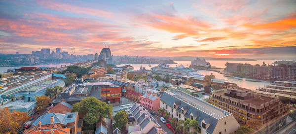 High angle view of buildings against sky during sunset