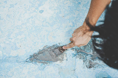 Low section of man legs in water