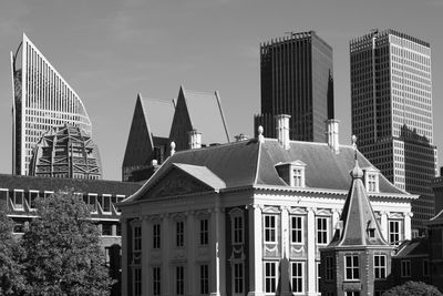 Modern cityscape against sky