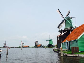 Boats in sea against sky