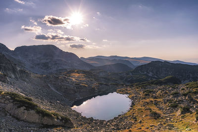 Scenic view of mountains against sky during sunset