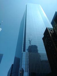 Low angle view of modern buildings against sky
