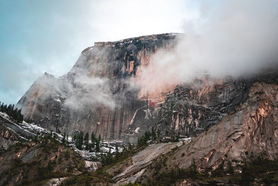 Panoramic view of rocky mountains against sky