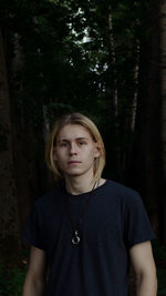 Portrait of teenage girl in forest