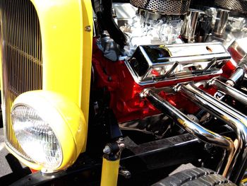 Close-up of yellow motorcycle