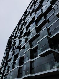 Low angle view of modern building against clear sky