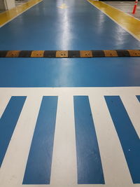 High angle view of zebra crossing in parking garage