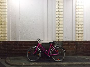 Cars parked in front of wall