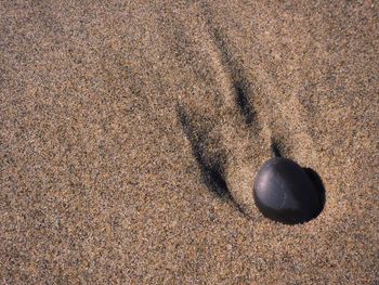 High angle view of sand on beach