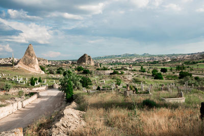 Panoramic view of landscape against cloudy sky