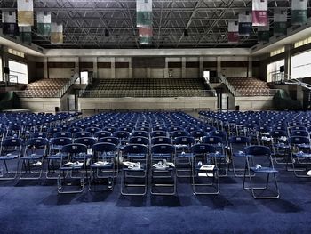 Empty chairs in stadium