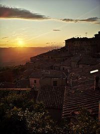 High angle view of townscape against sky at sunset