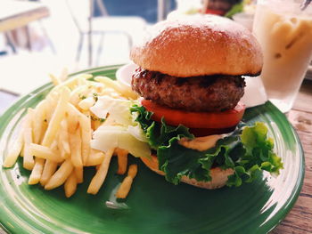 Close-up of burger in plate on table