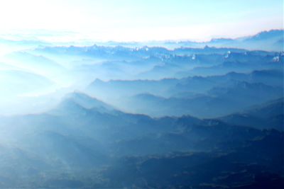 Scenic view of mountains against sky during sunset