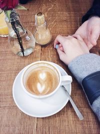 High angle view of coffee cup on table