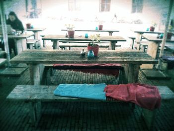 Cat relaxing on table