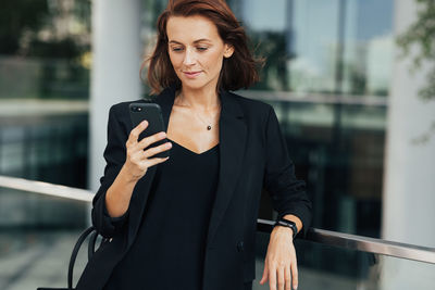 Young woman using mobile phone