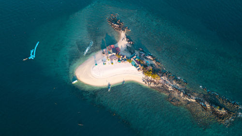 High angle view of people swimming in sea