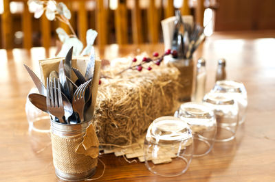 Close-up of wine glasses on table