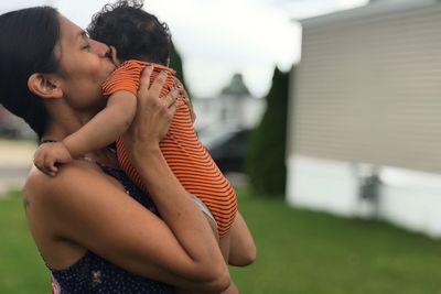 Side view of couple kissing